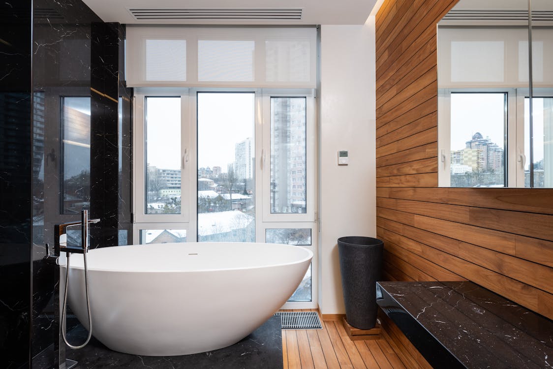 Free Modern bathroom interior with panoramic window Stock Photo
