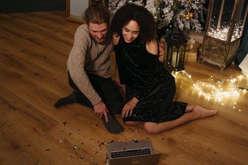 A Couple Sitting on the Floor