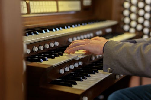 Free Close-Up Shot of a Person Playing Piano Stock Photo