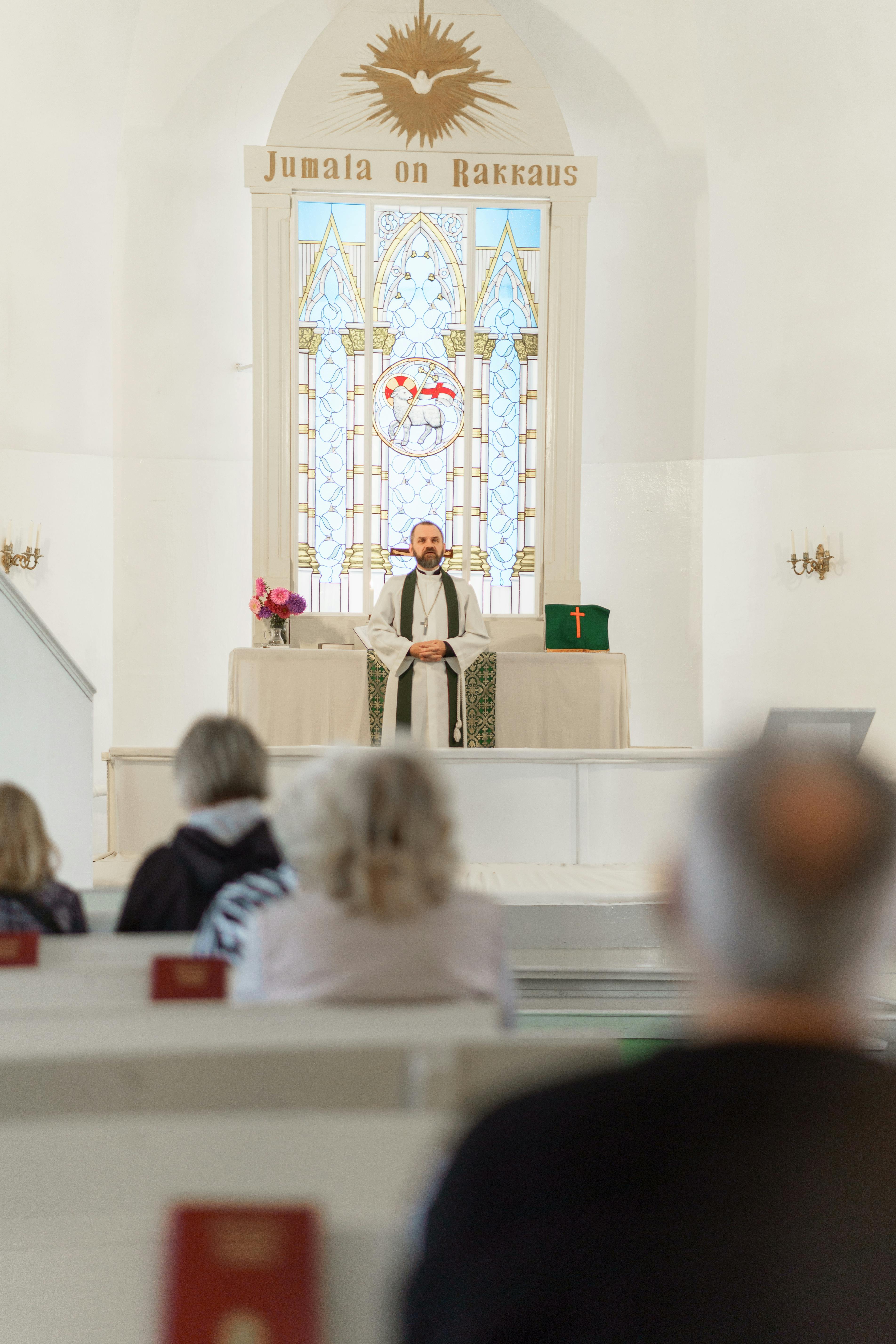 priest having a mass in the church