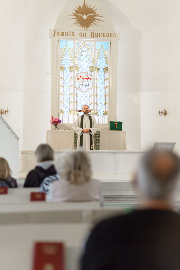 Priest Having A Mass In The Church