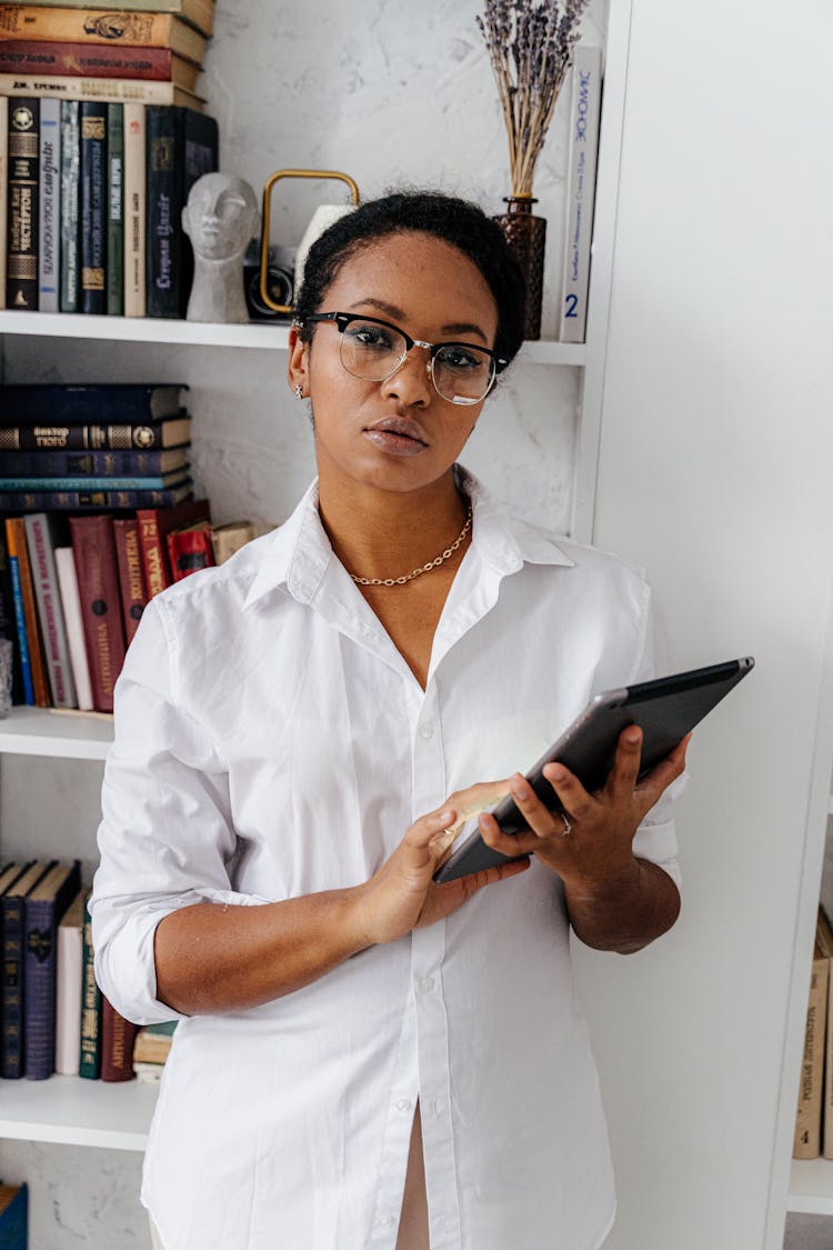 Woman Holding Black Tablet Computer