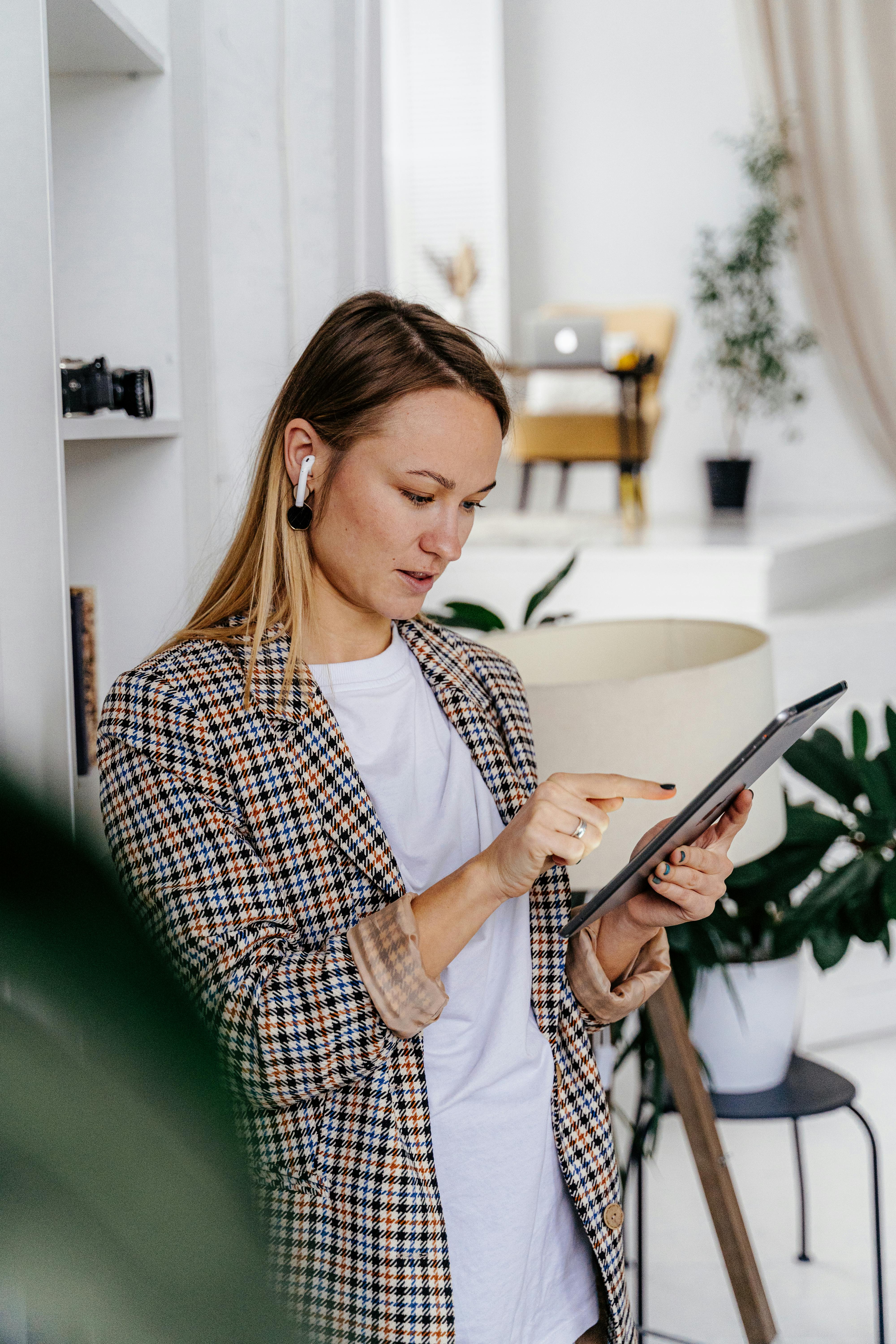 woman taking video call on tablet