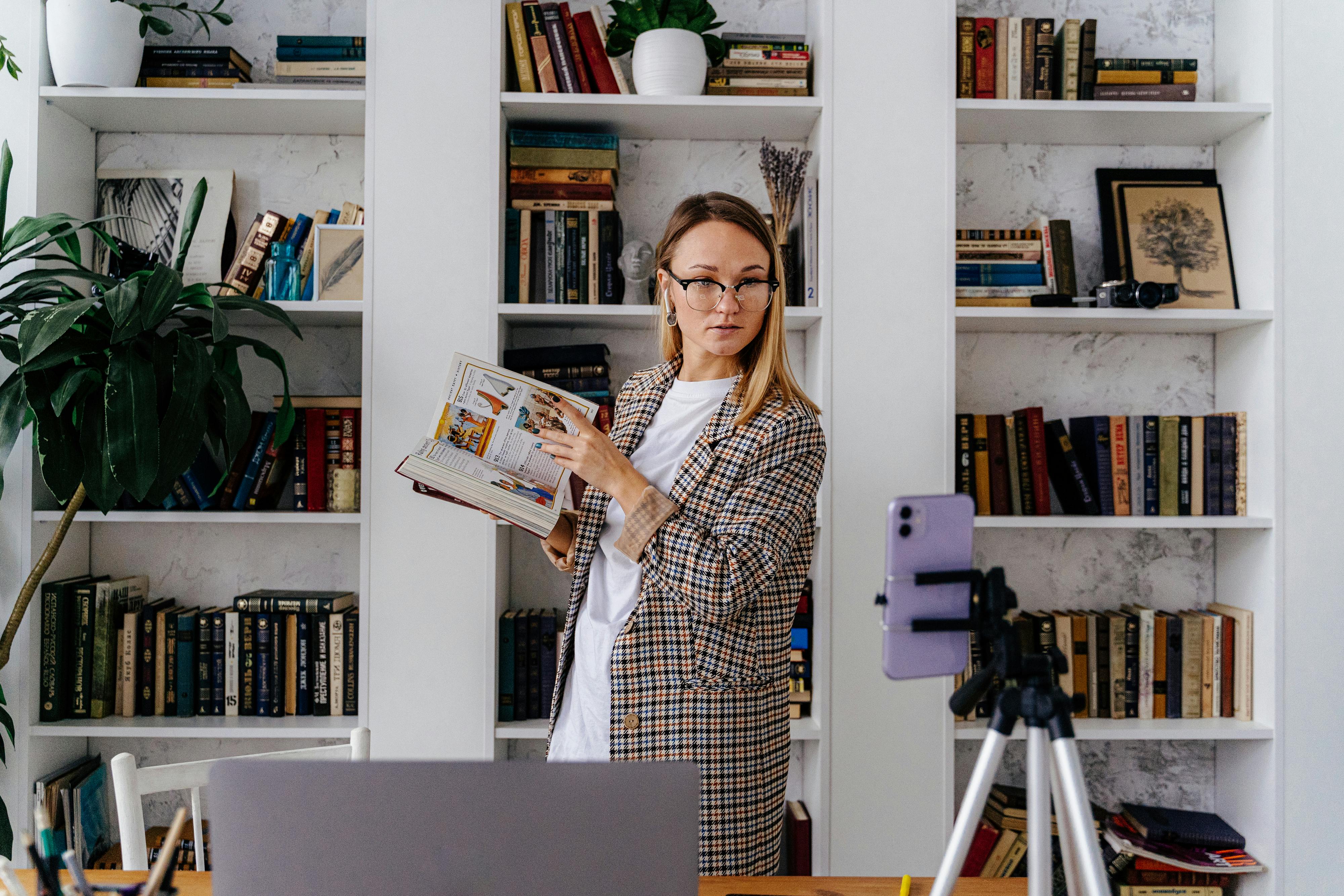 a woman holding a book