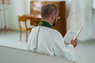 A Man Reading a Bible