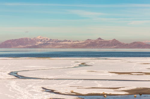 Frozen Lake and Mountain Range in the Distance 