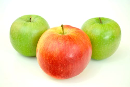 Free Red Apple With Two Green Apples Stock Photo