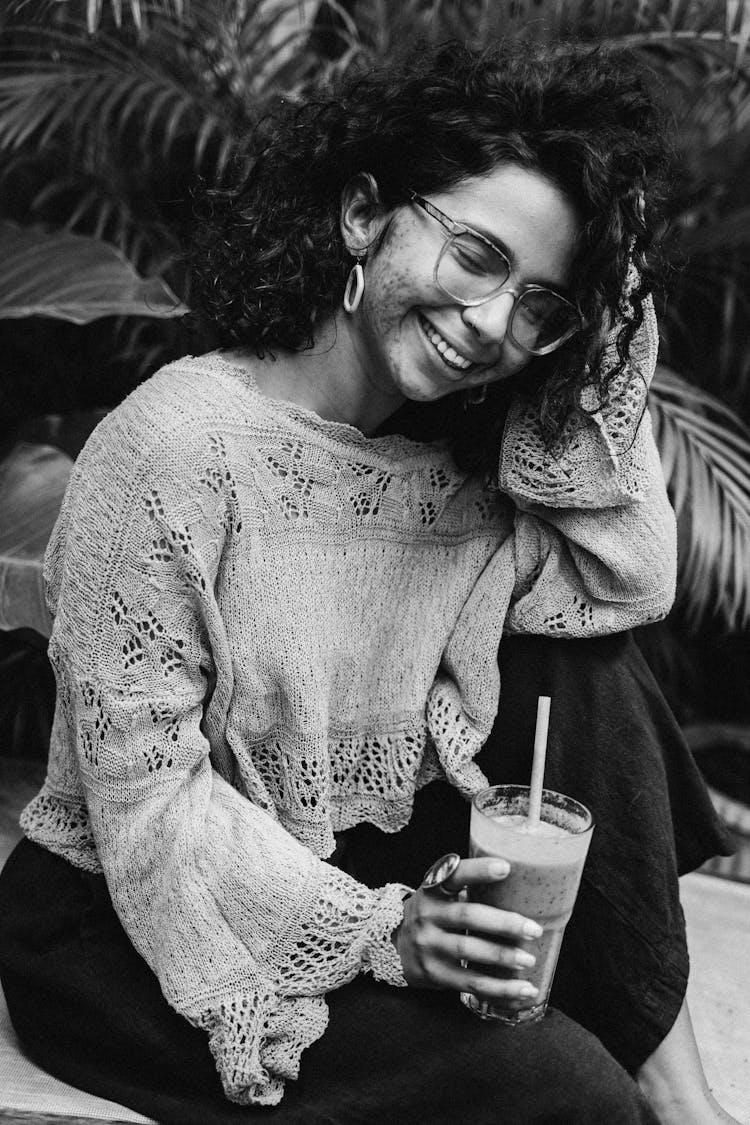 Portrait Of Woman Among Tropical Leaves In Black And White 