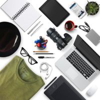 Phone and notebook on a desk — photo by OVAN on Pexels