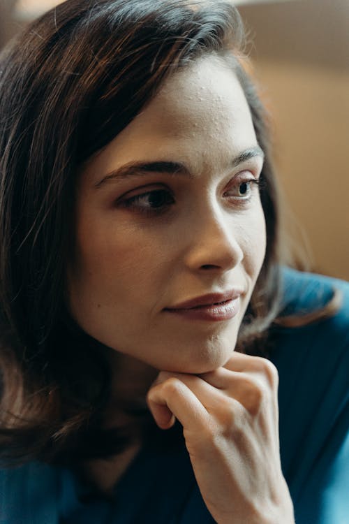 Portrait of a Woman Posing with Her Hand on Her Chin