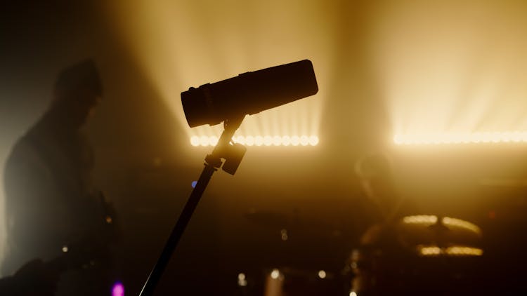 A Silhouette Of A Microphone