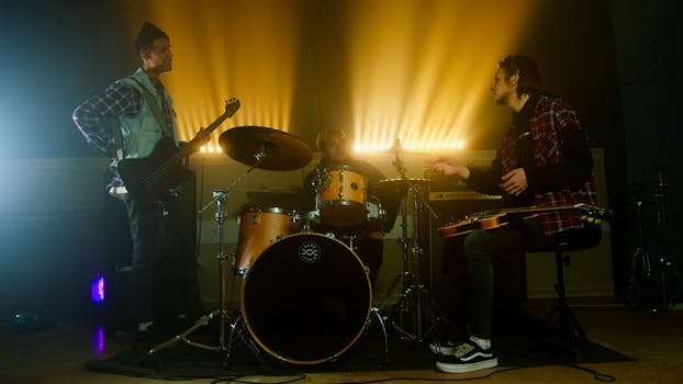 A vibrant scene of a rock band rehearsing with drums and guitars under dramatic lighting.