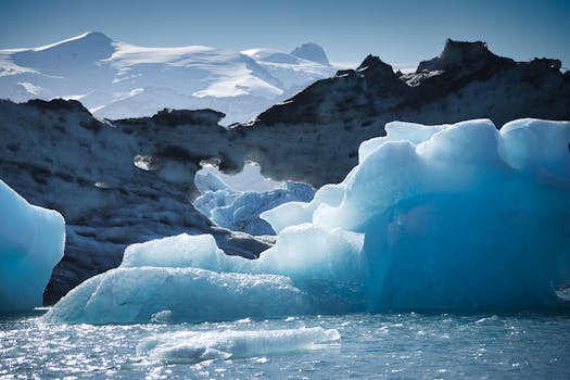Stunning blue icebergs in Iceland's Jökulsárlón Glacier Lagoon captured in winter light.