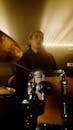A Man Playing Drums