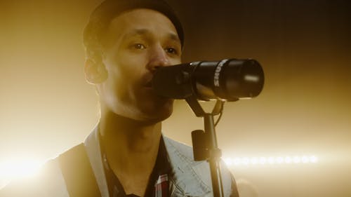 Close-Up Photograph of a Man Singing