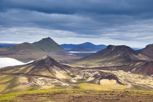 Free Stunning view of Icelandic mountains with dark clouds looming overhead, captured in the unique highlands. Stock Photo