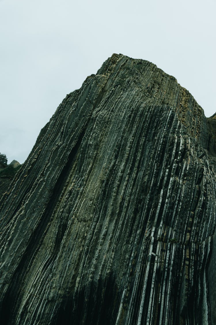 Steep Rough Rocky Formation In Mountainous Terrain