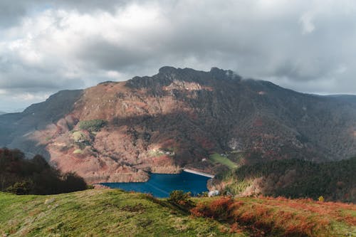 Calm blue lake in mountainous terrain