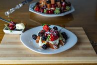 A Slice of Italian Christmas Cake on a Wooden Chopping Board