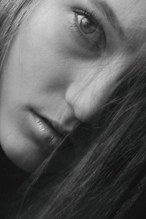 A Close-up of a Woman in Black and White