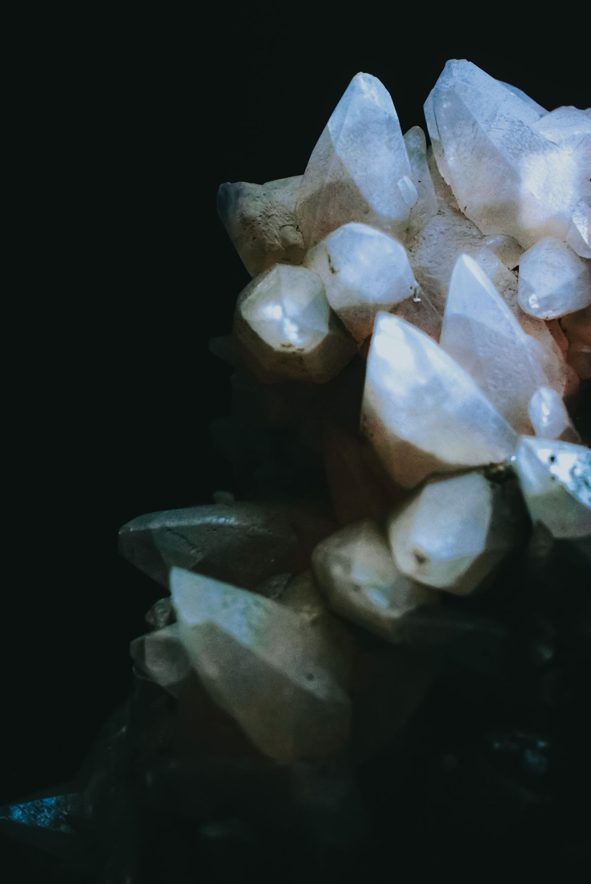 White quartz arranged on black in the studio