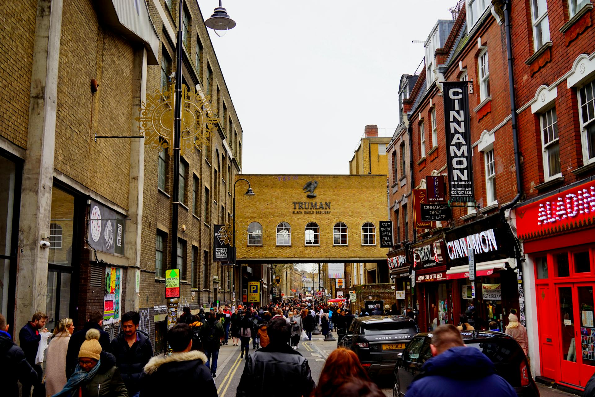 A bustling street scene near Truman Brewery in London's vibrant district.