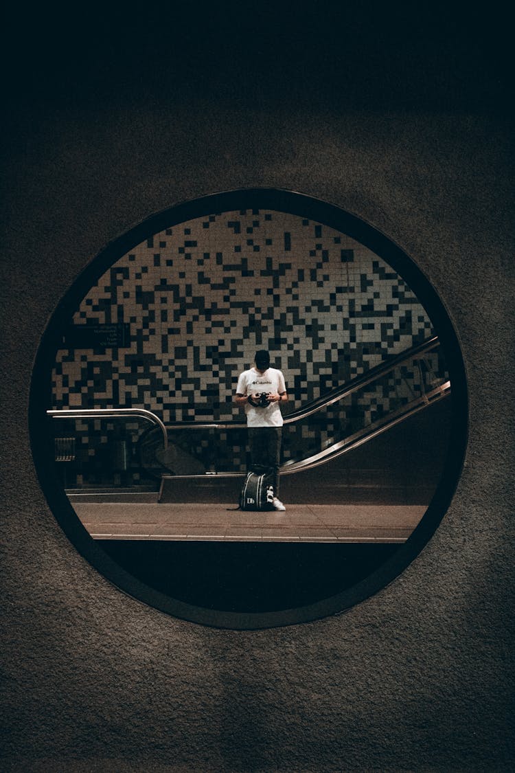 Reflection Of A Man On A Mirror