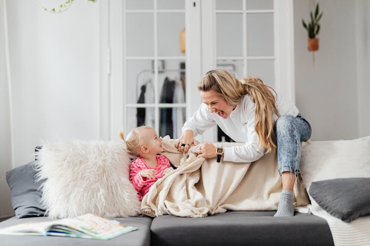 Mother Playing With Toddler Daughter