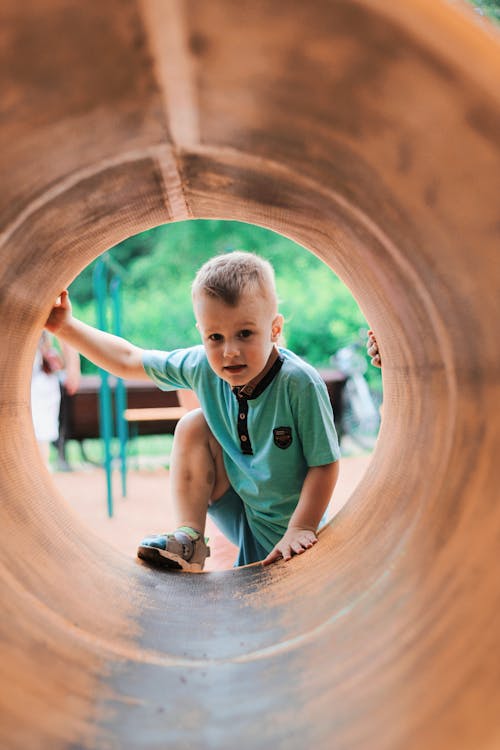 Cute Boy Playing in Tunnel 