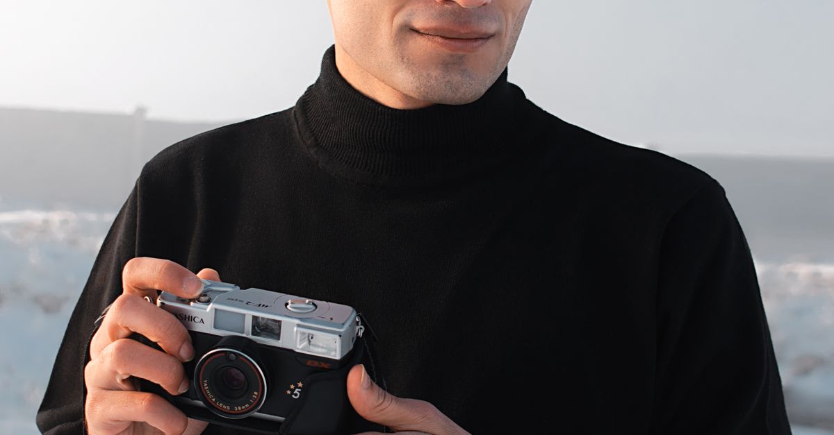 Men Click Camera Focus Focused man with photo camera · Free Stock Photo