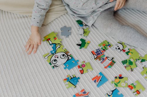 Kid Playing Puzzle