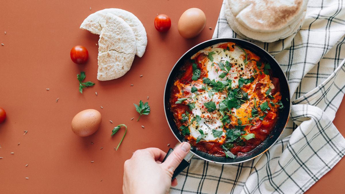 Shakshuka with cherry tomatoes and parsley