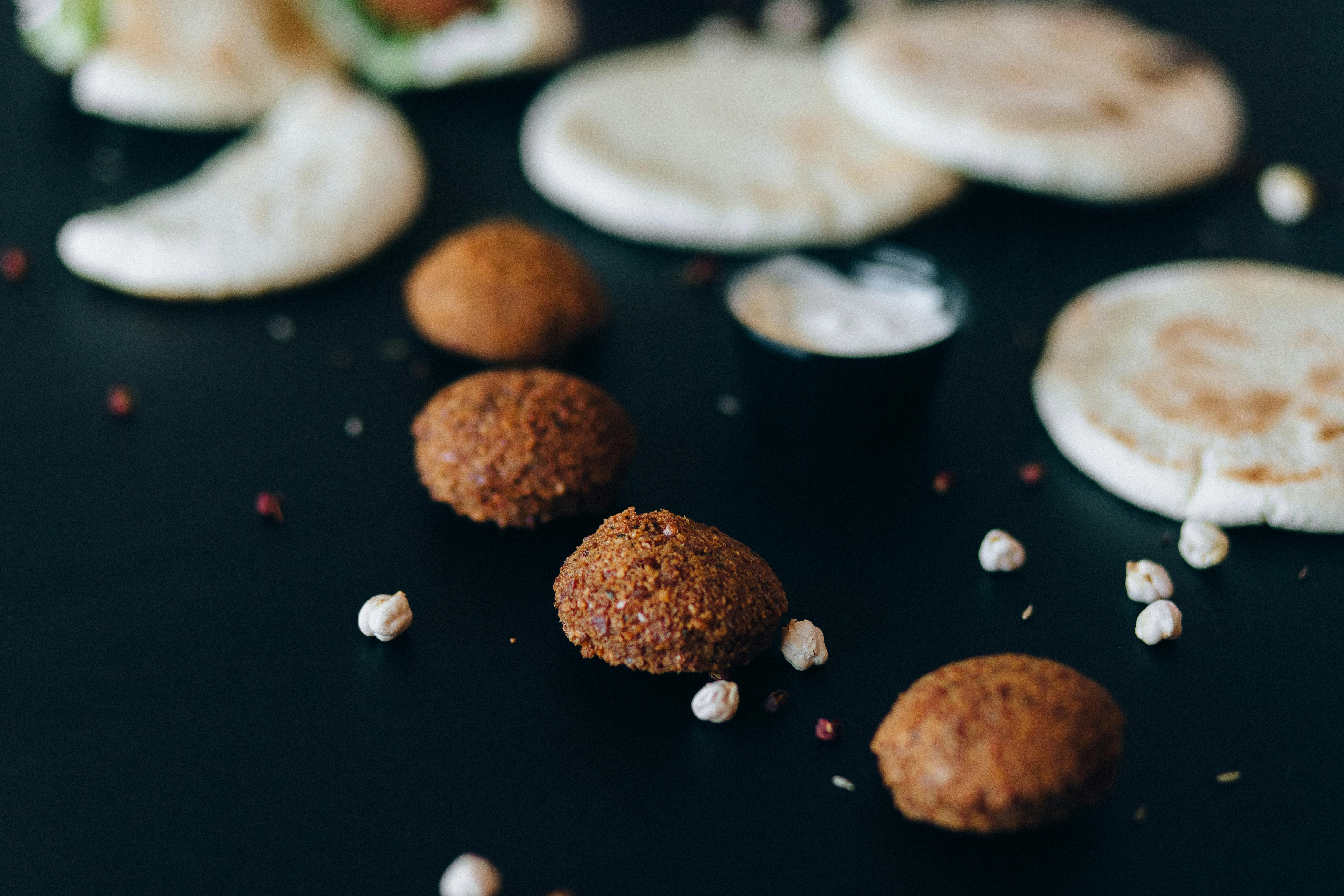 brown cookies on black table