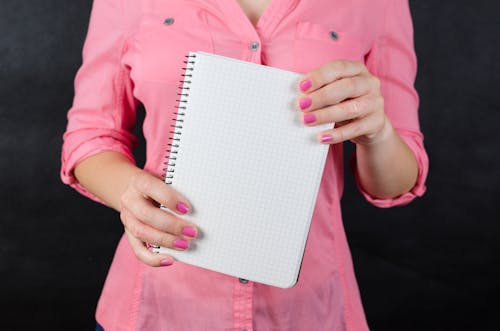 Free Person Holding White Graphing Paper Stock Photo