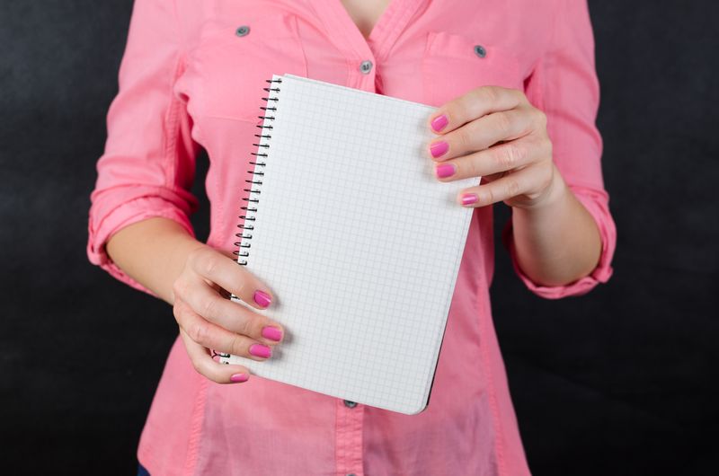 notepad with handwritten category list