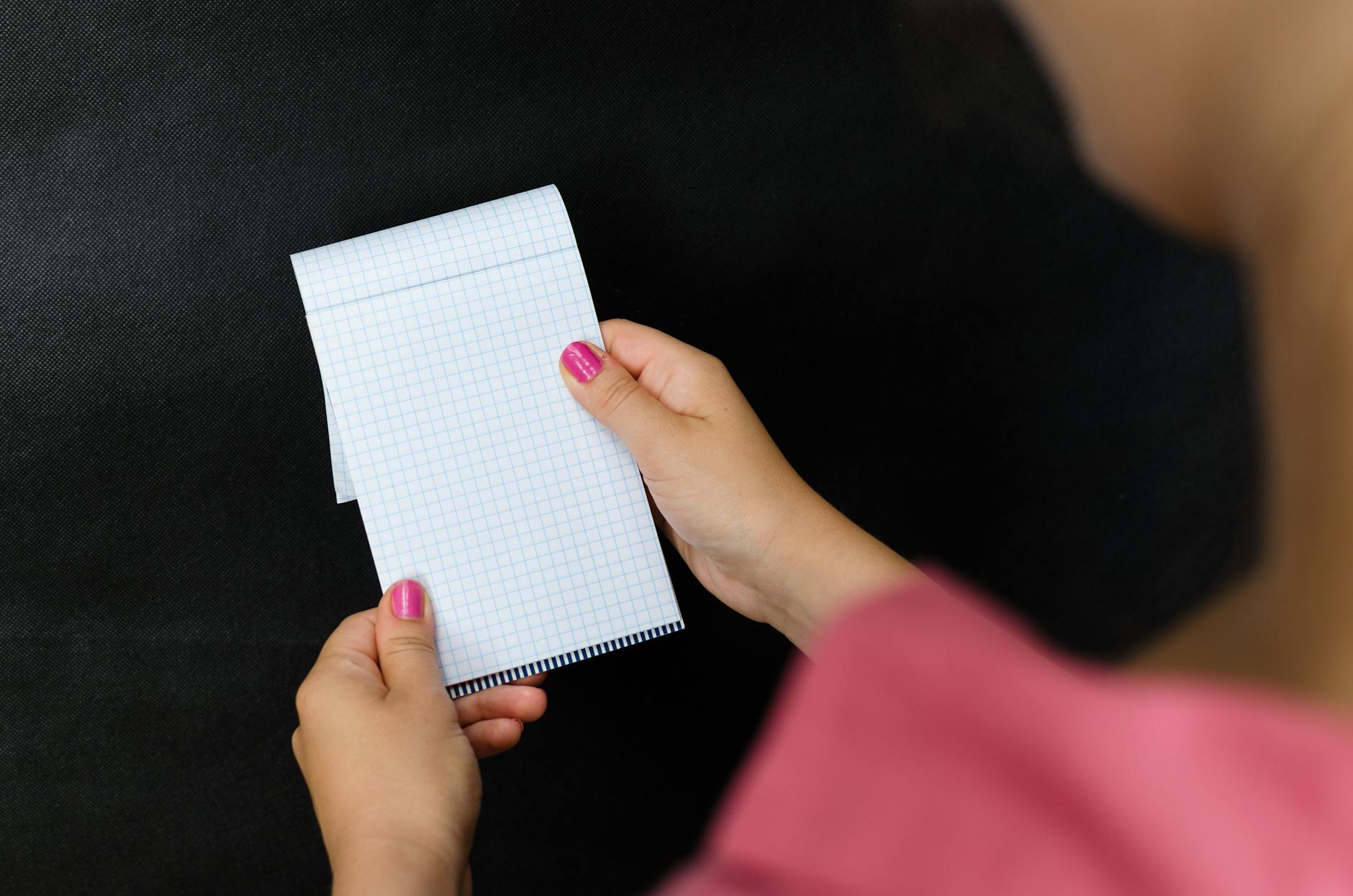 Person Holding White Textile