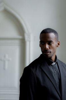 A Clergy in Black Suit