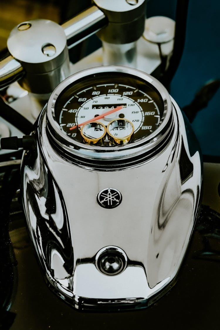 Wedding Rings Placed On Modern Motorbike Speedometer