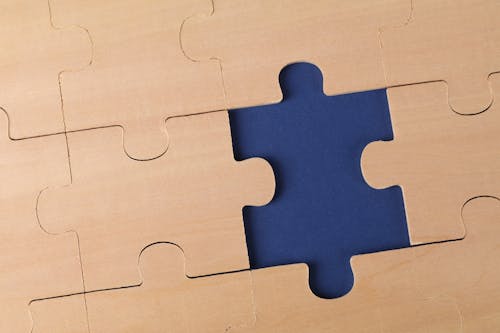 Close-Up Photo of an Unfinished Jigsaw Puzzle