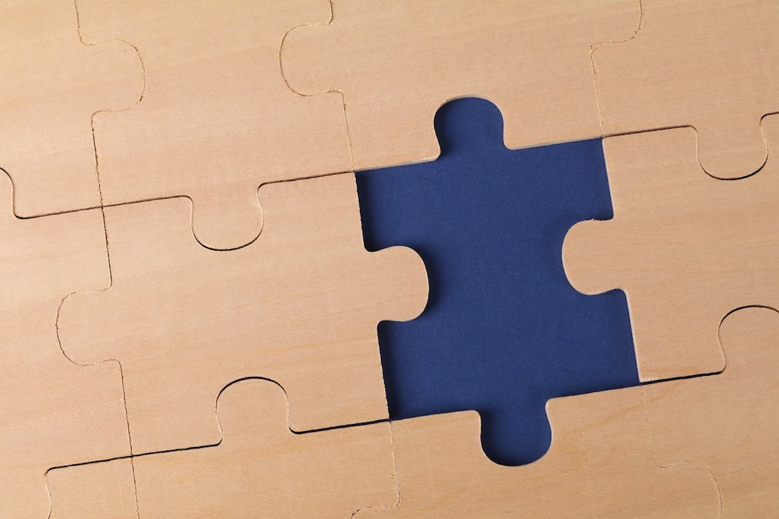 Close-Up Photo of an Unfinished Jigsaw Puzzle