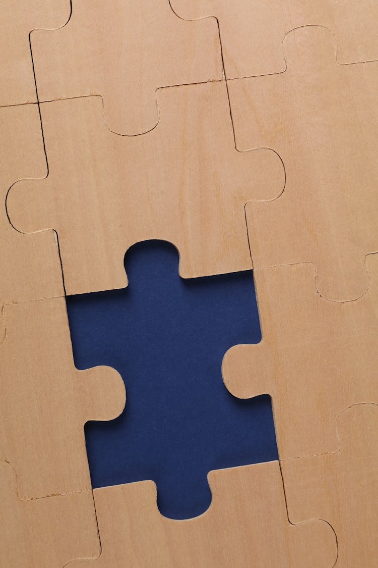 Close-Up Shot Of Wooden Puzzle Pieces