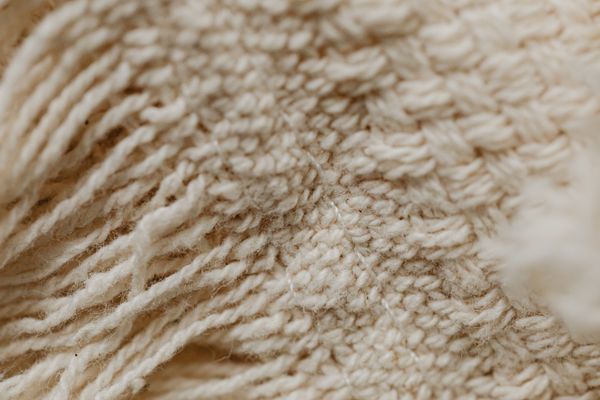Close-up of undyed woven textile — photo by Kaboompics on Pexels