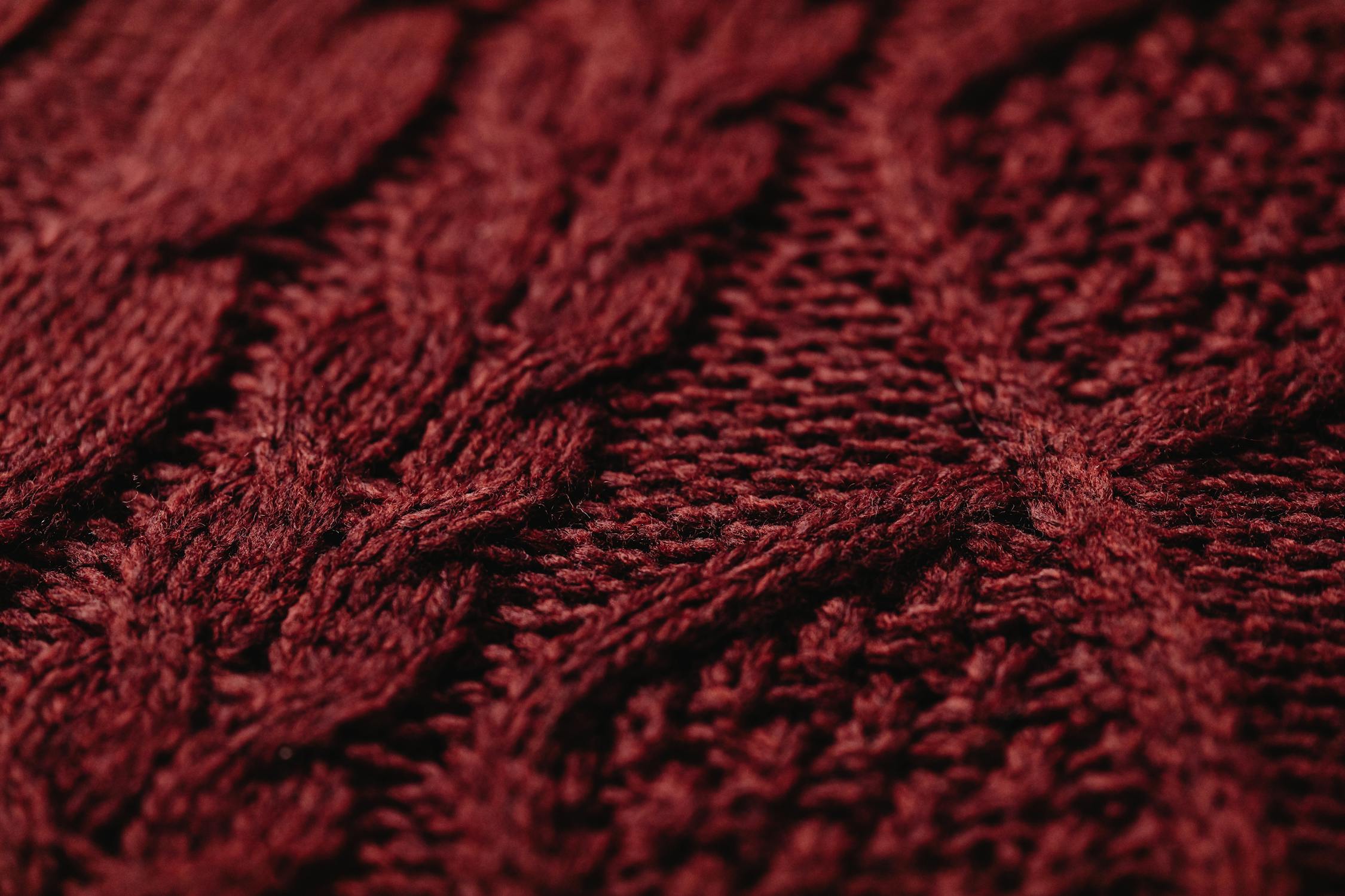 Close-Up Shot of a Red Knitted Textile · Free Stock Photo
