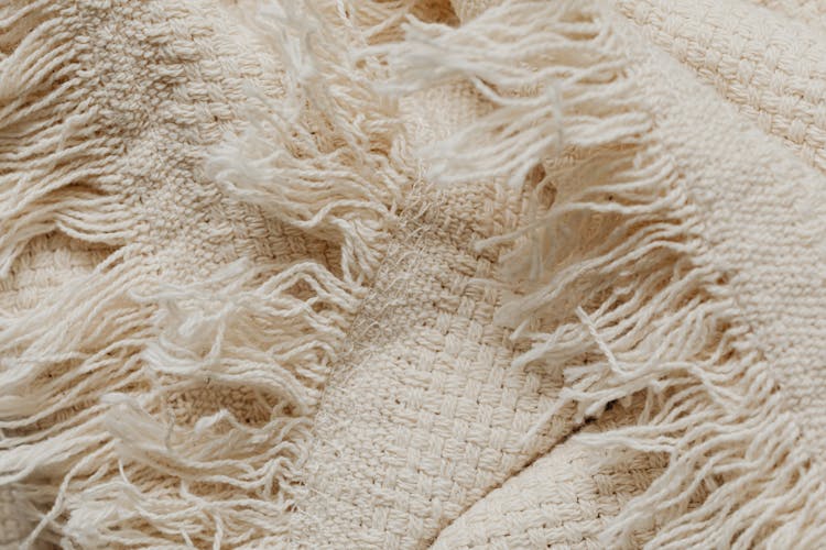 Close-Up Shot Of White Knit