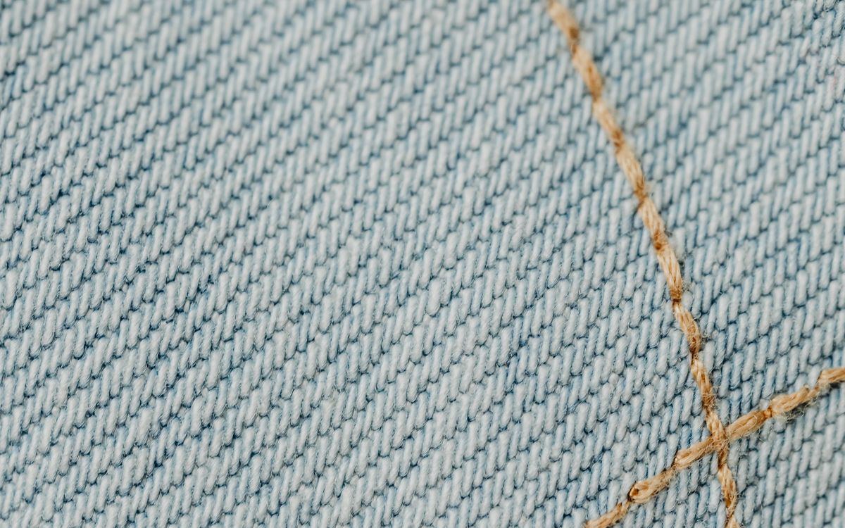 Embroidered line on fabric, macro