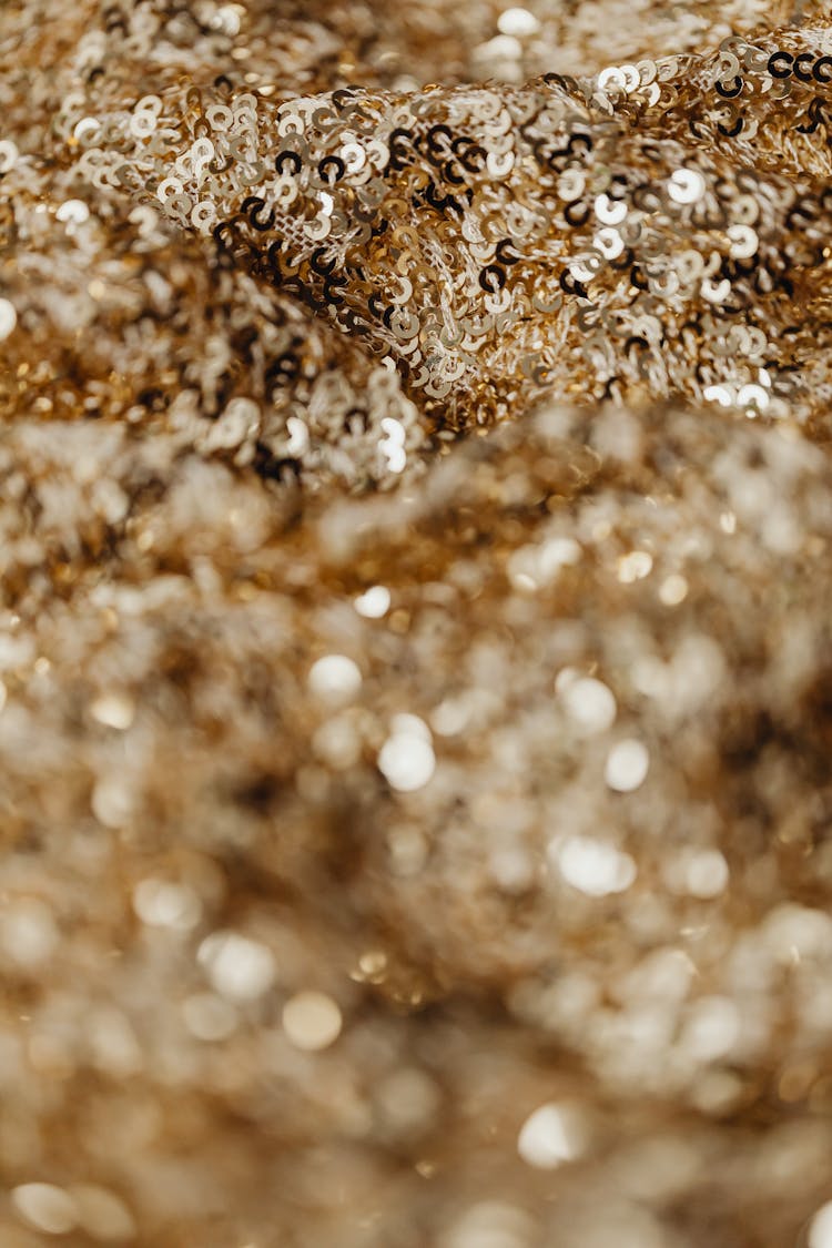 Close-Up Shot Of A Gold Sequin Fabric