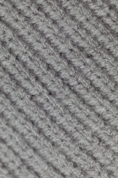 Free Close-Up Shot of Gray Knit Textile Stock Photo