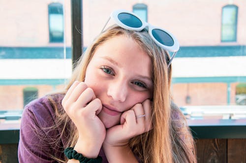 Portrait of Blonde Woman with Sunglasses