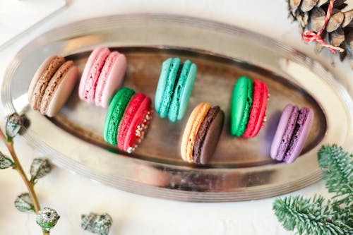 Delicious macaroons served on steel tray