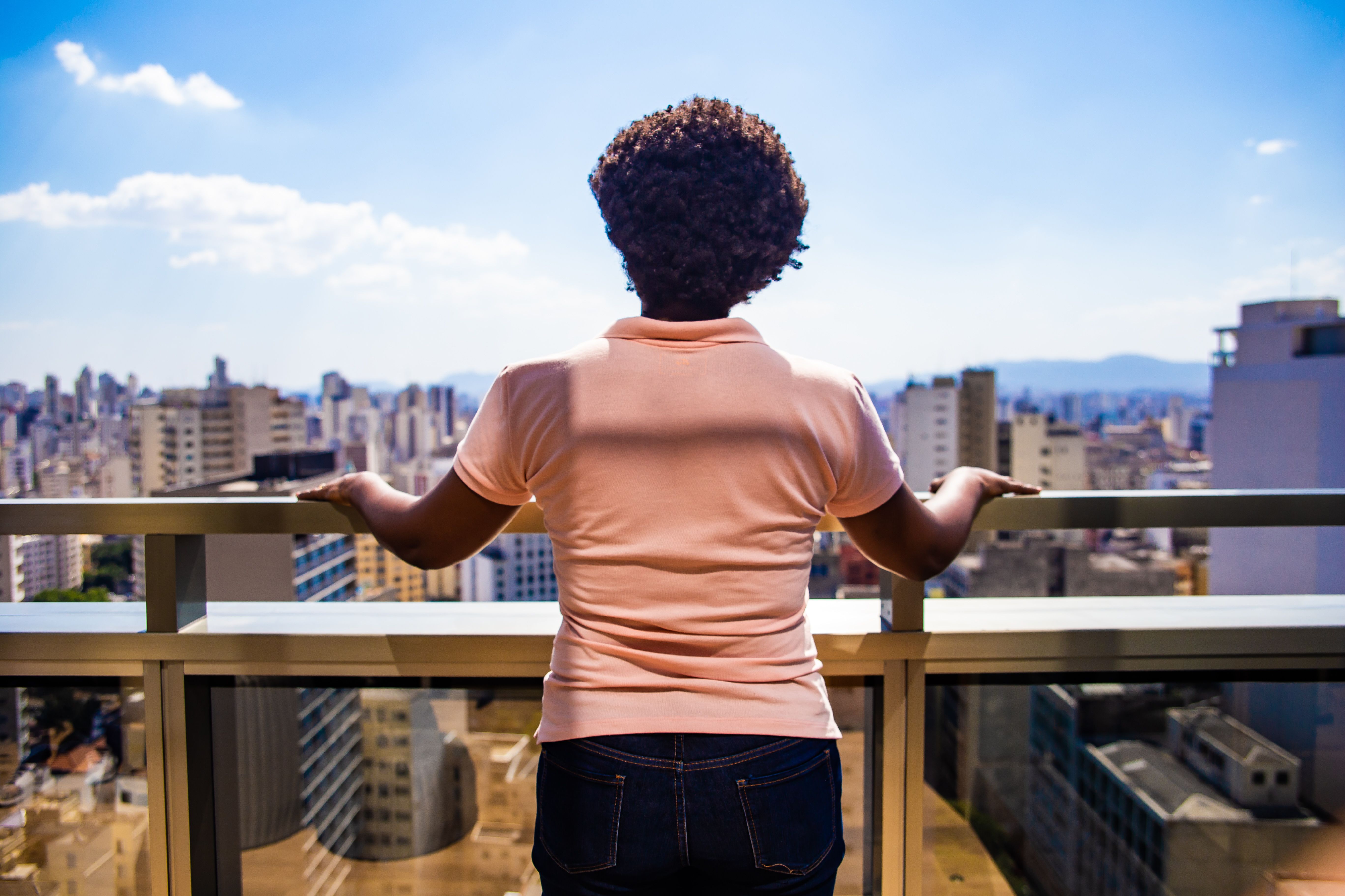 person looking at city skyline